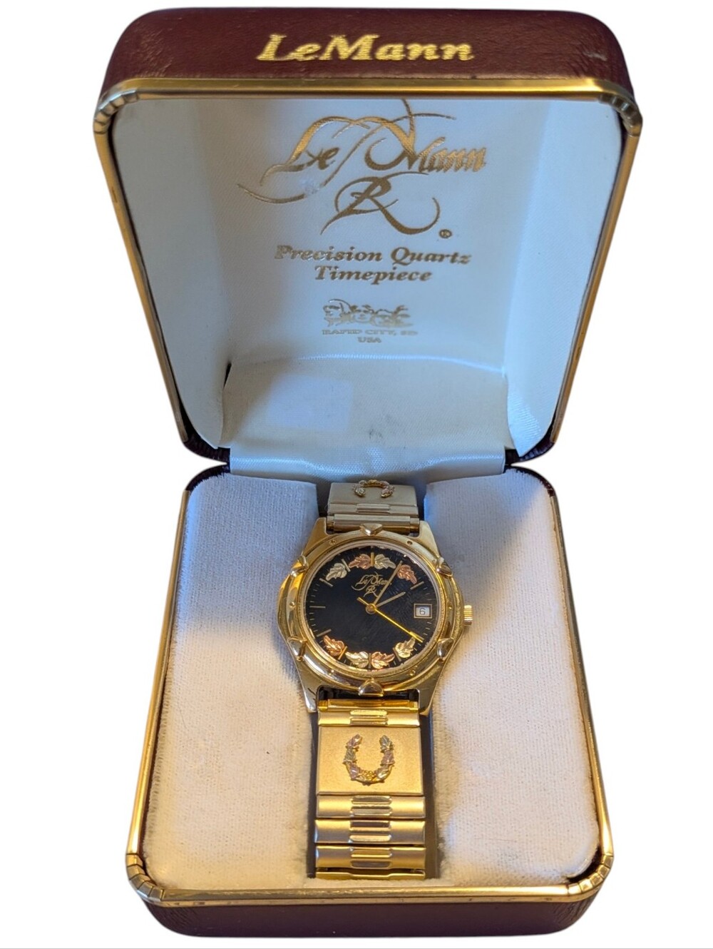 LeMann Precision Quartz Mens Watch with a Black Hills Gold face and Speidel Band